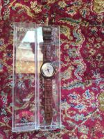 Chronographe swatch"Goldfinger"