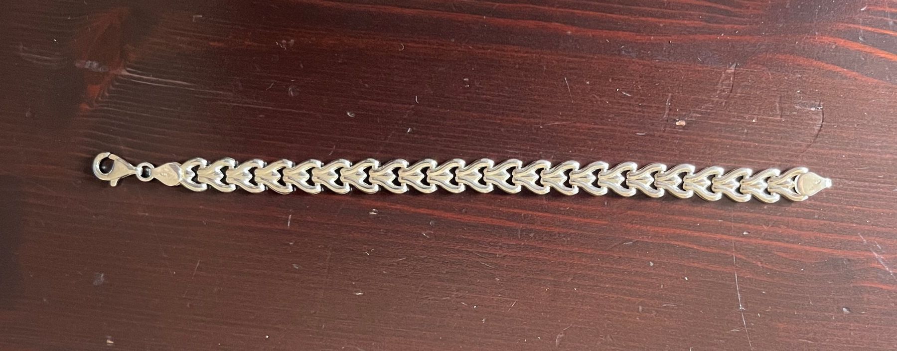 Bracelets: Bracelet en argent décorée en suite de coeurs – D'occasion à Genève par Donnet2 1