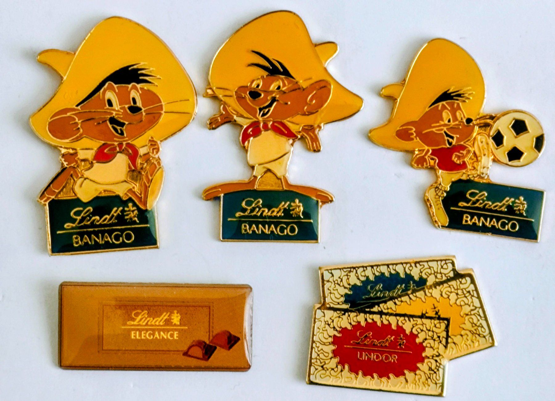 Lindt Plaketten & Abzeichen: 5 Pins Lindt Schokolade – Gebraucht aus Pfäffikon ZH von Colacity
