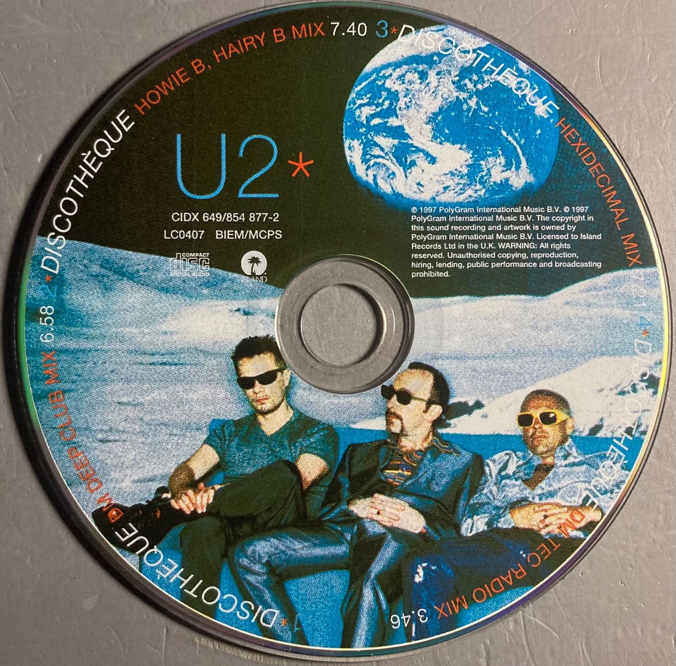CDs: U2 - DISCOTHEQUE – D'occasion à Poliez-Pittet par Newtown-Records 1