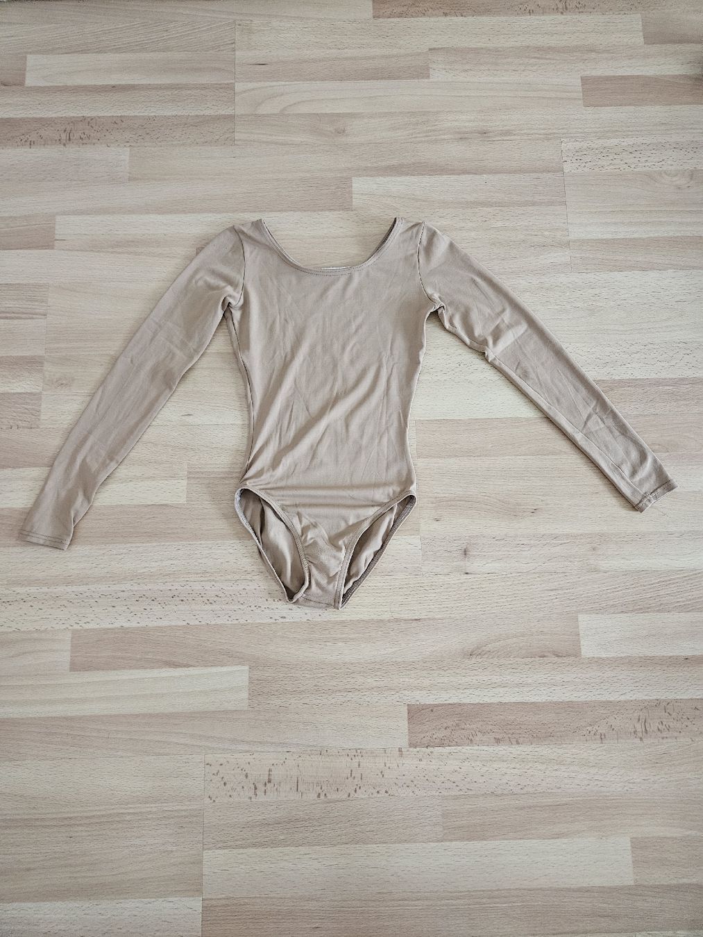 Blusen, T-Shirts & Tops: Body Langarm Beige Kinder Grösse 140 neuwertig – Gebraucht aus Thun von bia_crh9