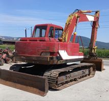Bagger Kobelco 13 Tonnen mit Schild
