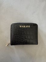 Portemonnaie von Makani schwarz Krokooptik