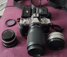 Nikon Z f/c, 3 objectifs, flash, SD, état neuf et soigné.