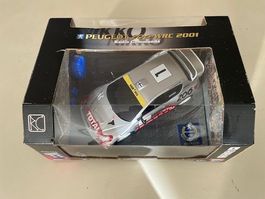 voiture  télé commandée 1/24 Peugeot
