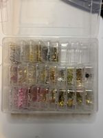 Vari charm per creare gioielli/portachiavi
