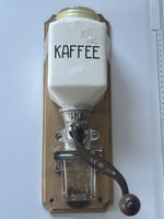 Kaffeemühle Wandmodell Keramikbehälter Metallguss H.T.(I27)