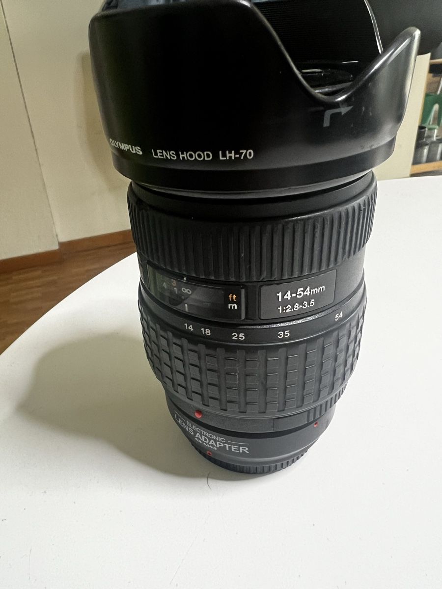 Olympus Obiettivi: Olympus Zuiko 14/54mm 2.8/3.5 – Usato da Petit-Lancy venduto da Ri.Ga.Sa 1
