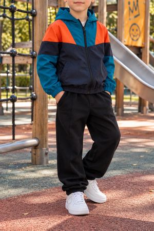 VESTE COUPE-VENT ENFANT À CAPUCHE