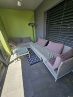 Verkaufe eine gebrauchte 4-teilige Gartenlounge aus Rattan