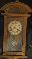 Superbe horloge murale ancienne en bois avec balancier