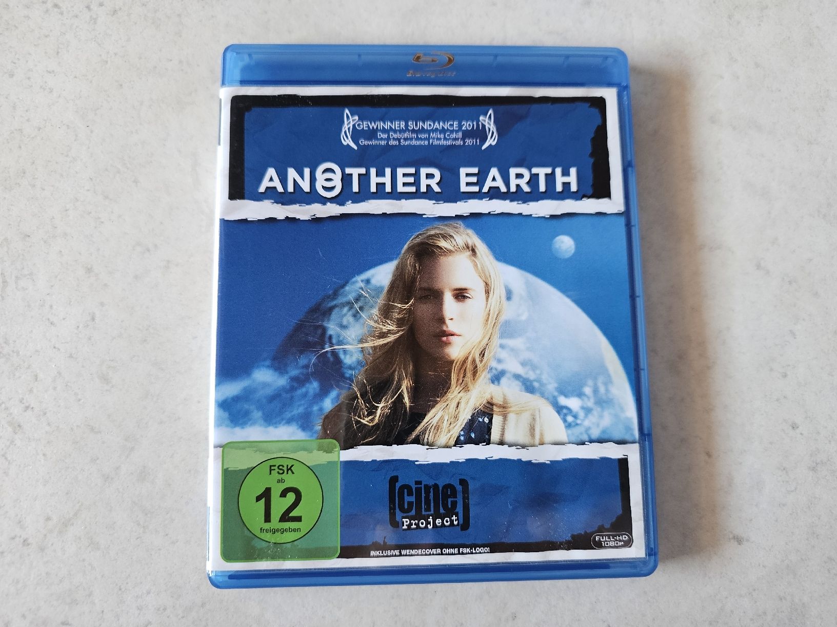 Tutti i DVDs: Another Earth  /  Bluray – Usato da Schneisingen venduto da backstore24