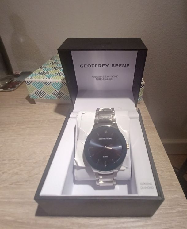 Montre Geoffrey Beene avec diamant et certificat Acheter sur Ricardo