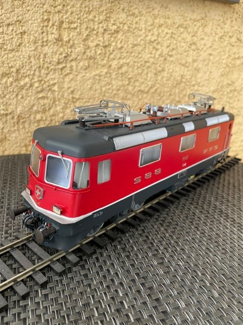 Hermann Modellini di ferrovie: Re 4/4 rot Hermann – Nuovo e nell'imballaggio originale da Schlieren venduto da Kasimir19 4