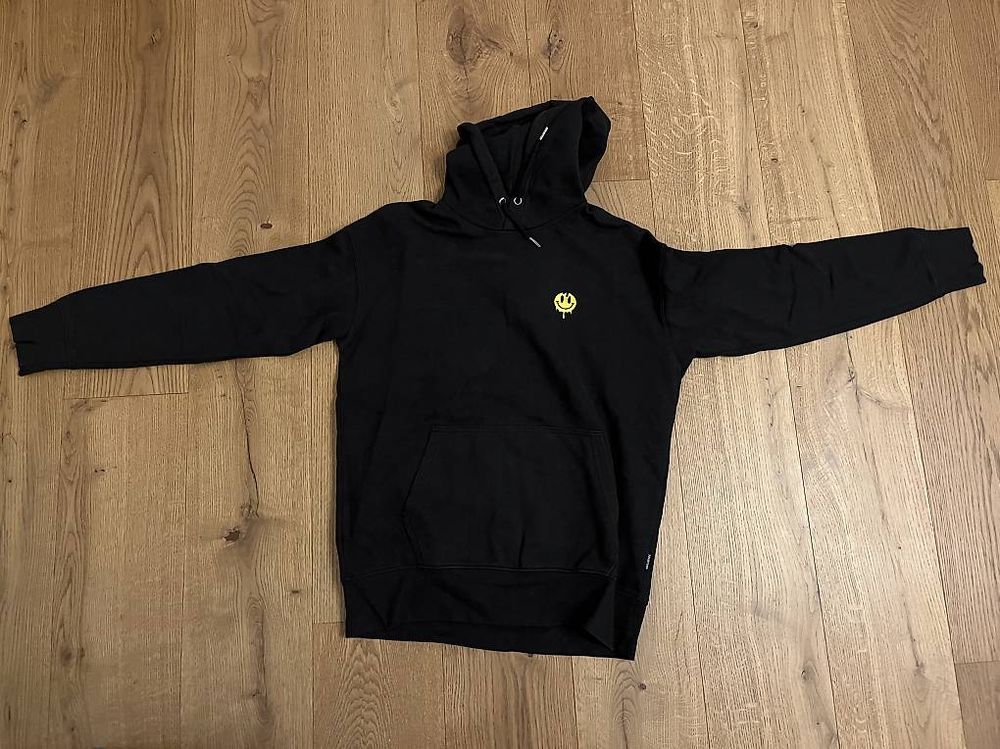 Black hoddie with a smile 1