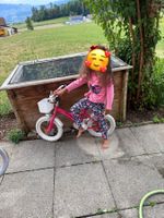 Kinderfahrrad Pink mit Korb und Sternen Grösse 12 Zoll