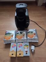 Machine Tassimo Bosch avec capsules diverses. Bon état.
