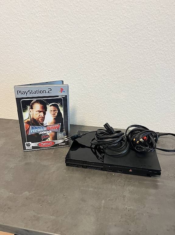 Spiele: PS 2 Slim mit WWE spiel  – Gebraucht aus Fislisbach von The.Notorious