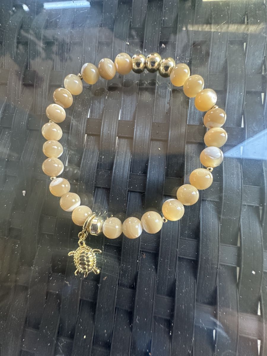 Bracciali & Braccialetti: Perlmutt Stretch Armband mit Anhänger  – Nuovo e nell'imballaggio originale da Kriens venduto da Hortensie6 2