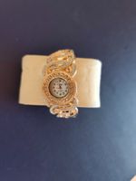 Damen Uhr goldfarben mit Steinen NEU