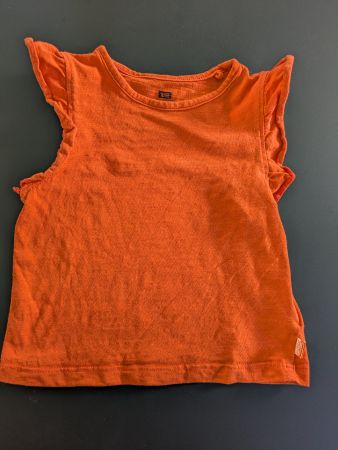 T-Shirt in orange mit Rüschen von WE Fashion, Grösse 86