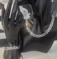 Set collana e bracciale colore argento nuovo stato