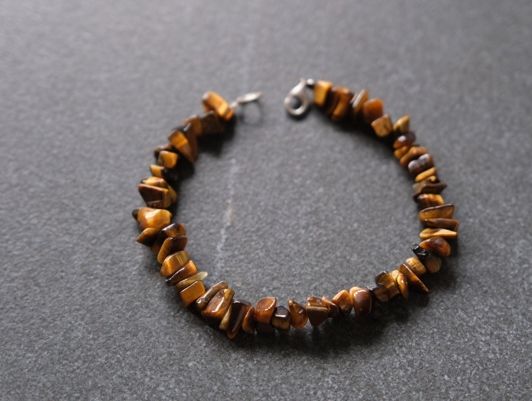 Bracciali & Braccialetti: Armband (Tigerauge) – Usato da Wohlen AG venduto da Exitburn