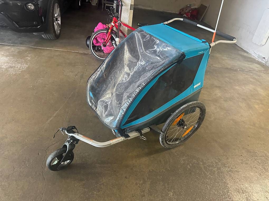 Thule Rimorchi: Remorque enfant Thule, Coaster XT, bleu, bon état – Usato da Grand-Lancy venduto da lil_6c8g