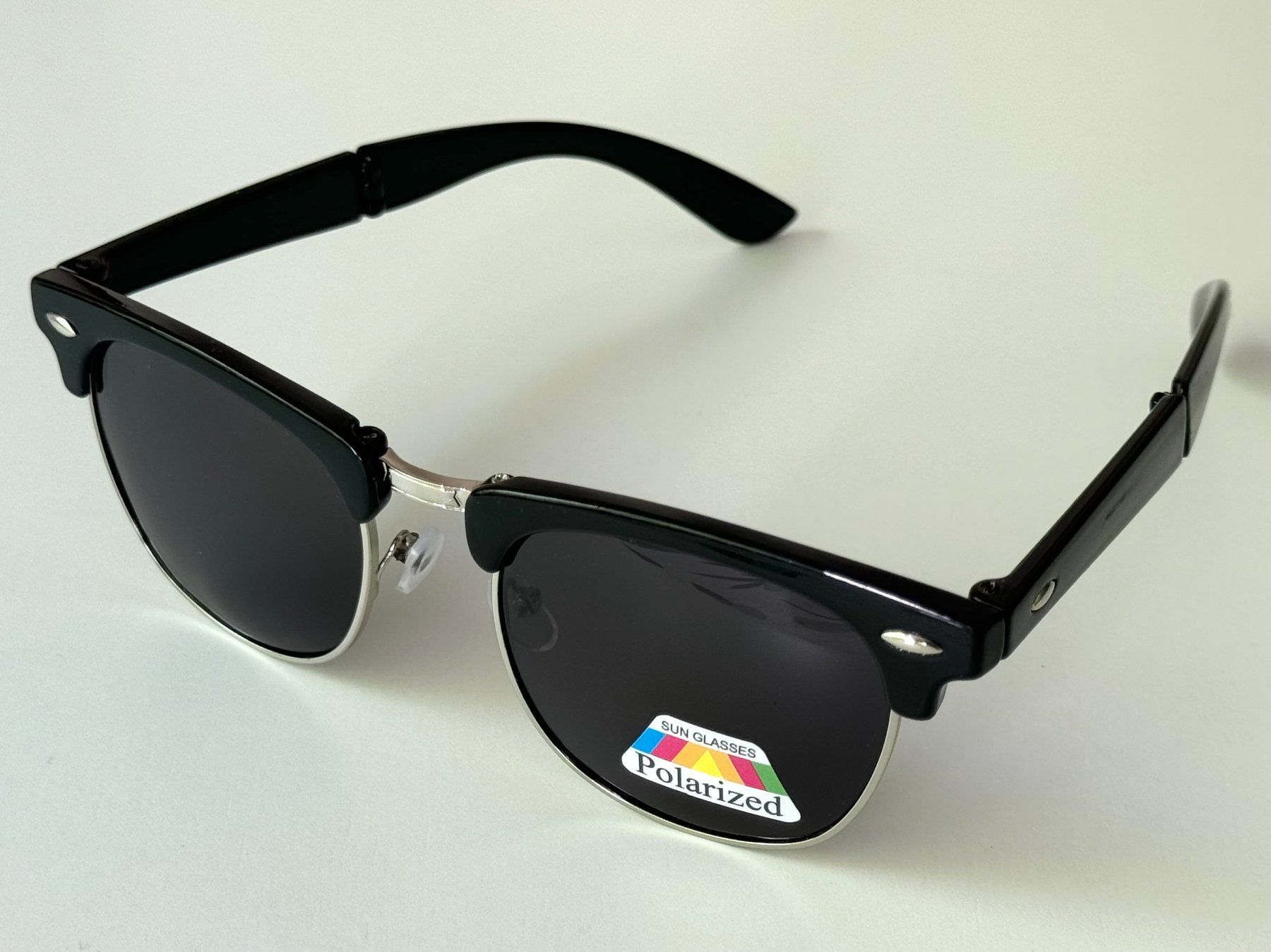 Occhiali & Lenti: Lunettes de soleil noires polarisées pliables compact – Usato da Genève venduto da Reveur 1