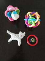 4x tönendes / raschelndes Baby - Spielzeug