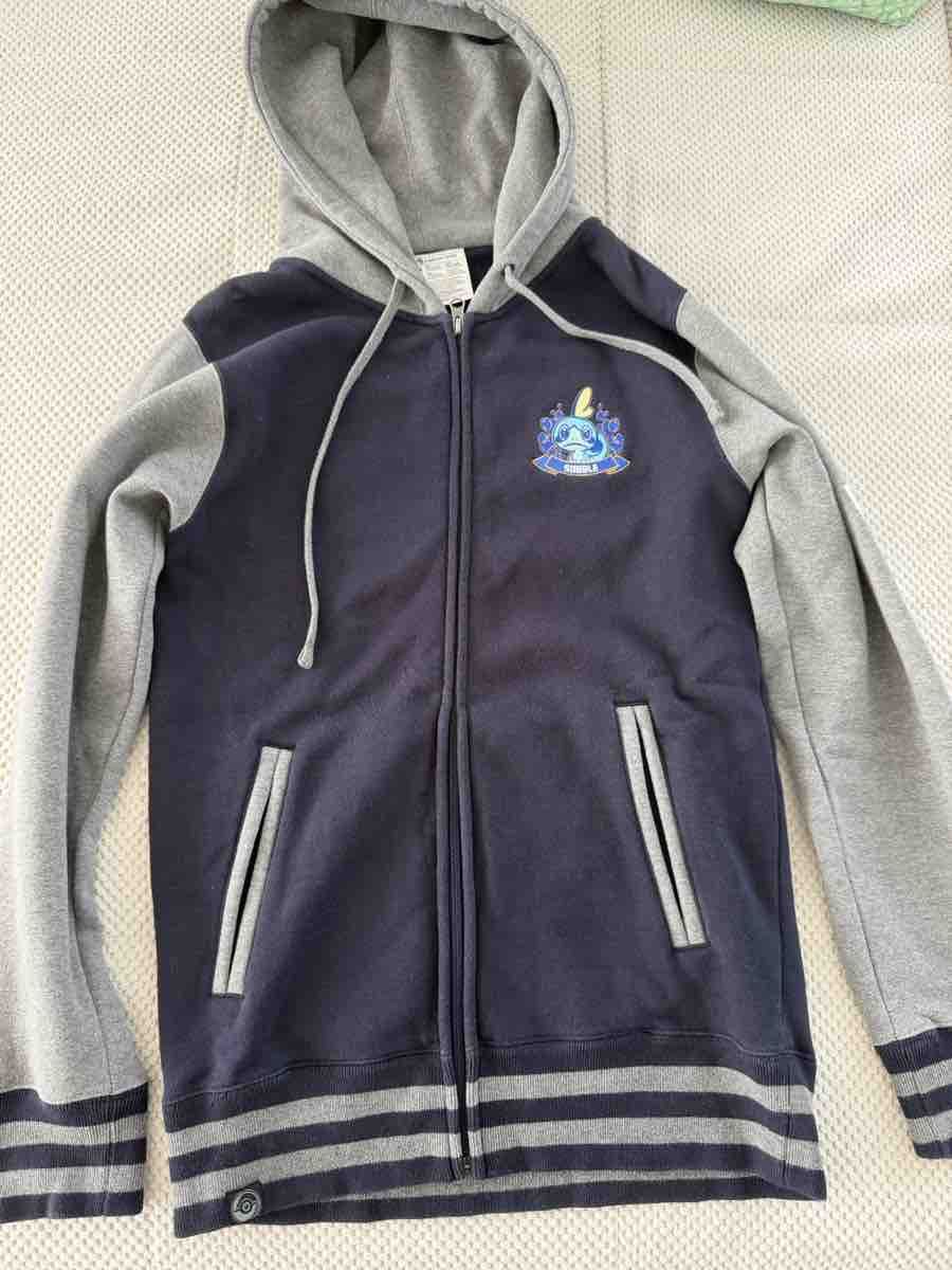 Giacche: Pokémon Kapuzenjacke Sobble – Usato da Uitikon Waldegg venduto da Se14 1