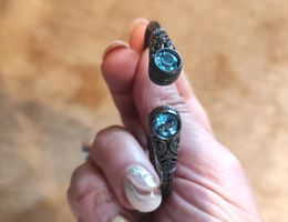 ANTIC ARMREIFENARMSPANGE MIT TOPASST. HANDARBEIT, LEGIERUNG