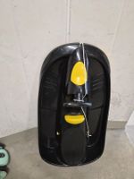 Black sledge with yellow accents - Winter Fun for Kids!