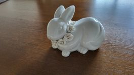 Deko-Hase aus Porzellan mit Blumenkranz  L 19/ H 13 cm