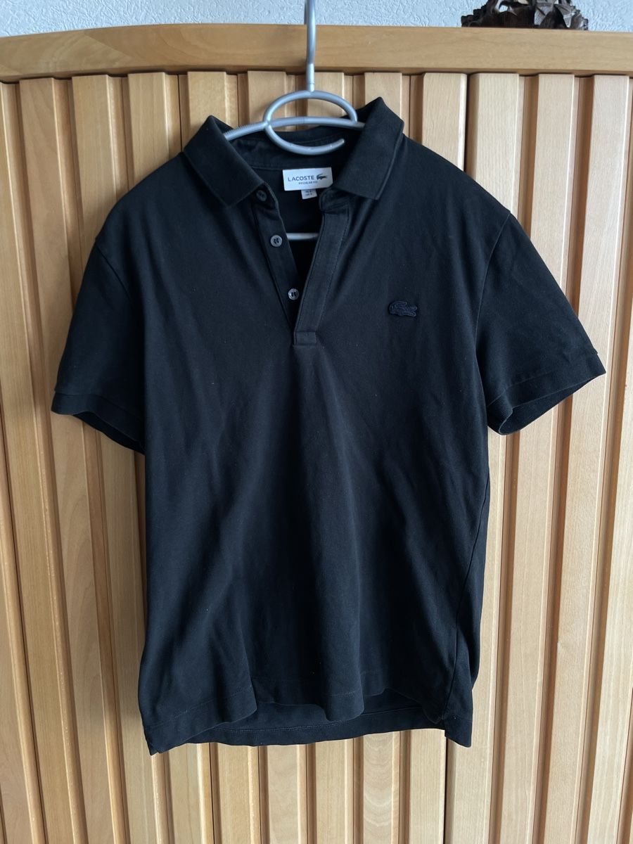 Lacoste Magliette Polo: Lacoste - full black polo - Excellent condition – Usato da Onnens VD venduto da Slyce