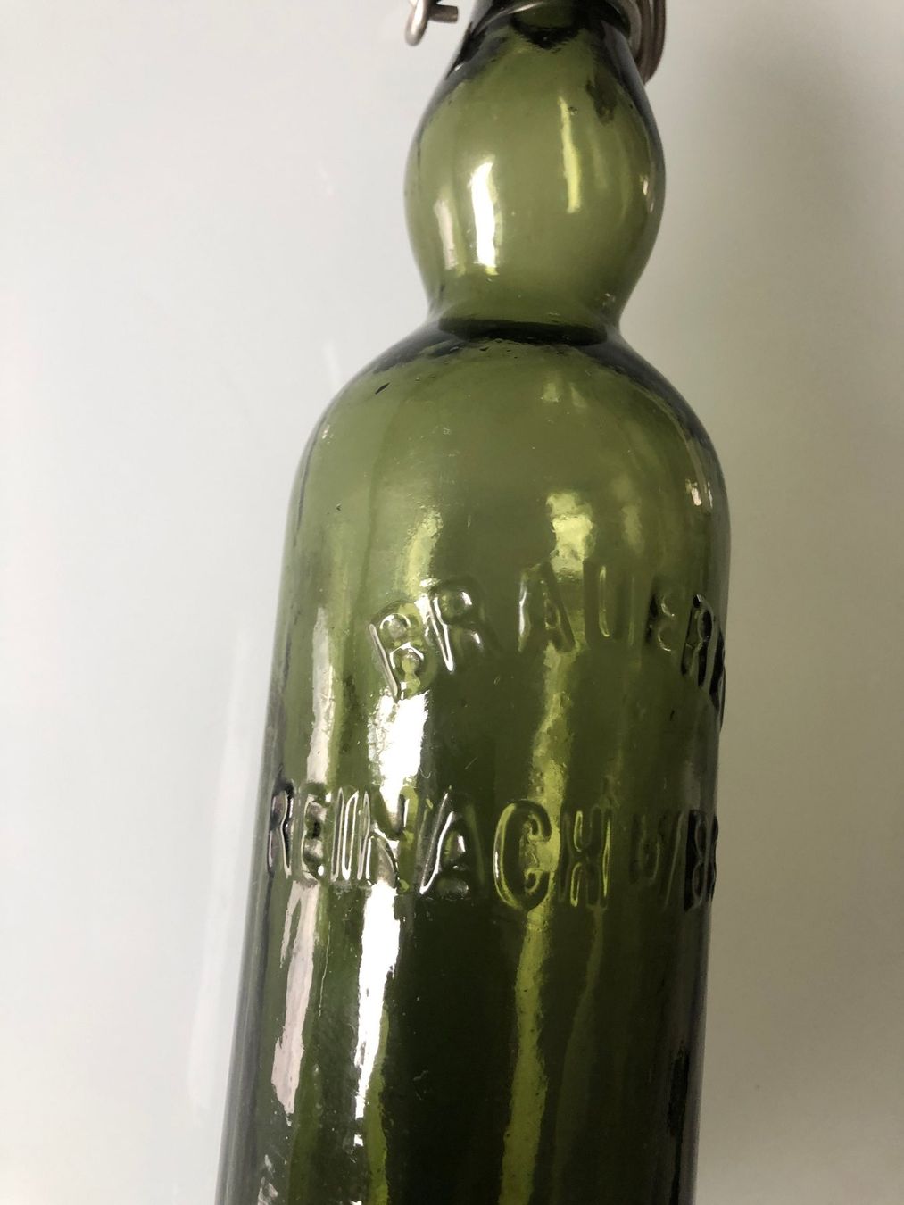 Bottiglie: BRAUEREI REINACH b/ BASEL Glasrelief – Usato da Ettingen venduto da glaed 5