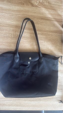 Sac cabas Longchamp noir pliable état d'usage