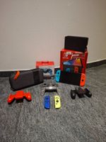 Nintendo Switch OLED mit viel Zubehör und Spielen