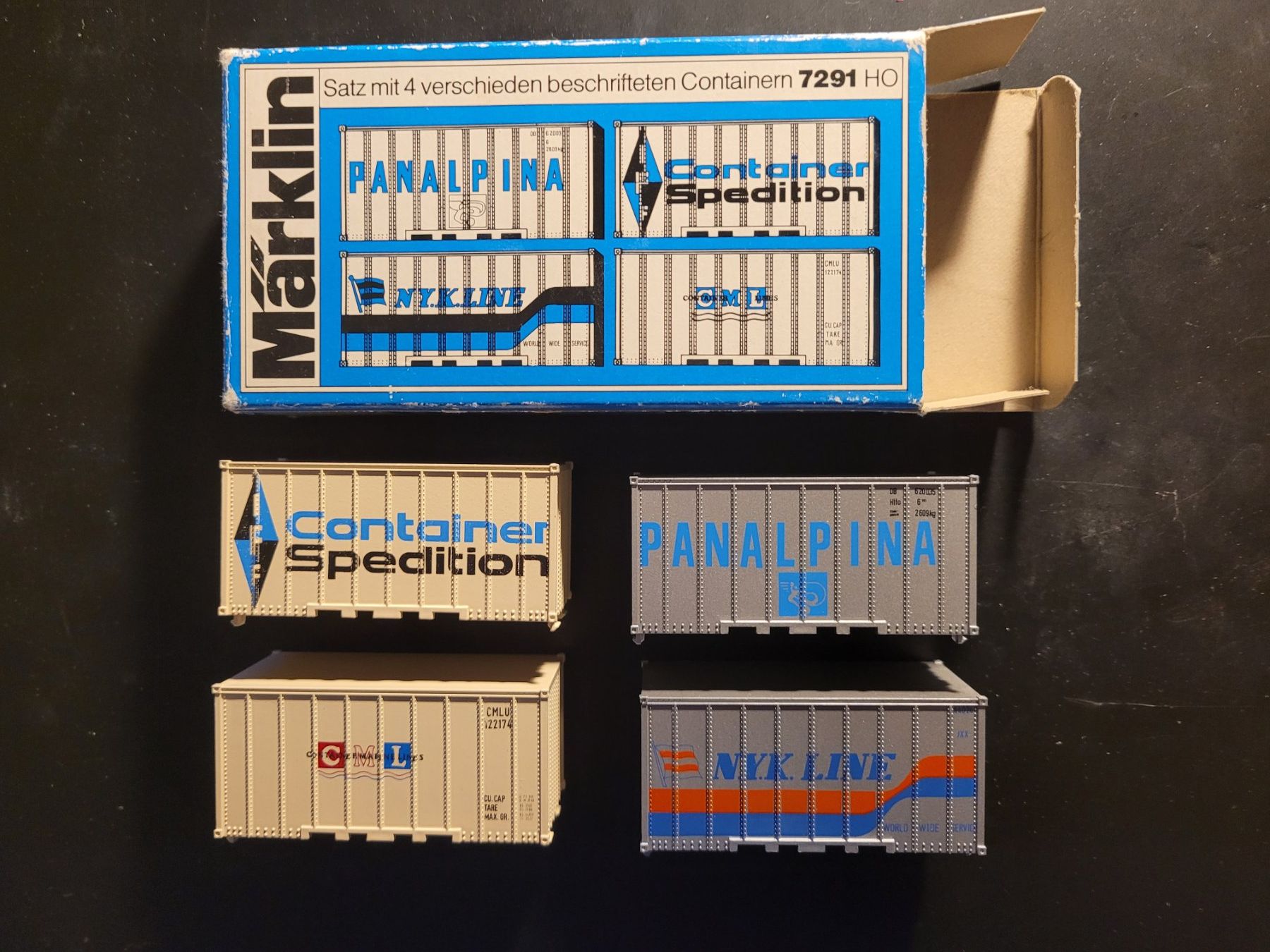Märklin Modellini di ferrovie: Märklin H0 7291 - 4 containers à inscriptions différentes – Nuovo e nell'imballaggio originale da Payerne venduto da tintin08 1