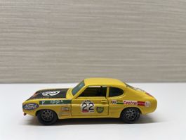 Spielauto 1:43 Ford Capri gelb mit Werbung guter Zustand