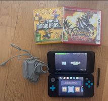 Nintendo 2DS XL Türkis/Schwarz – 2 Spiele inklusive