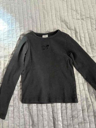 Pull Zara fille noir taille 130 cm comme neuf