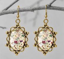 Boucles d'oreilles pendantes fleurs métal doré neuf