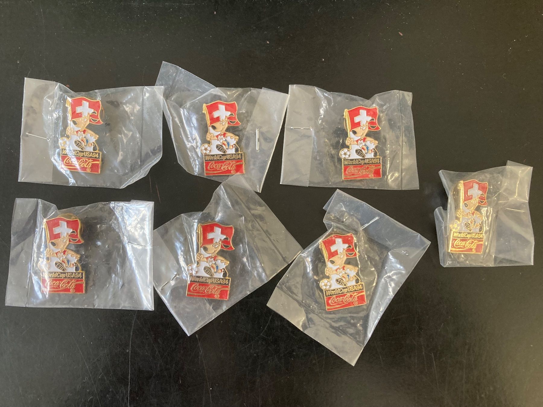 Coca-Cola Placchette & Badge: 7 Pins Coca Cola / World Cup USA94 – Nuovo e nell'imballaggio originale da Riehen venduto da freestyle_buttons