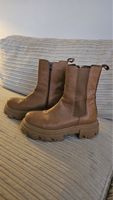 Damen Stiefeletten braun Plateau Reissverschluss getragen