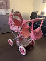 Puppenwagen rosa mit Tasche in gutem Zustand