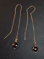 Longues boucles dorées avec petites perles en verre brun