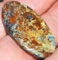 Anhänger gelocht L-7307 – Pietersit Cabochon 23.55 Karat ca.