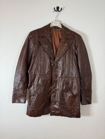 Man vintage leather brown jacket