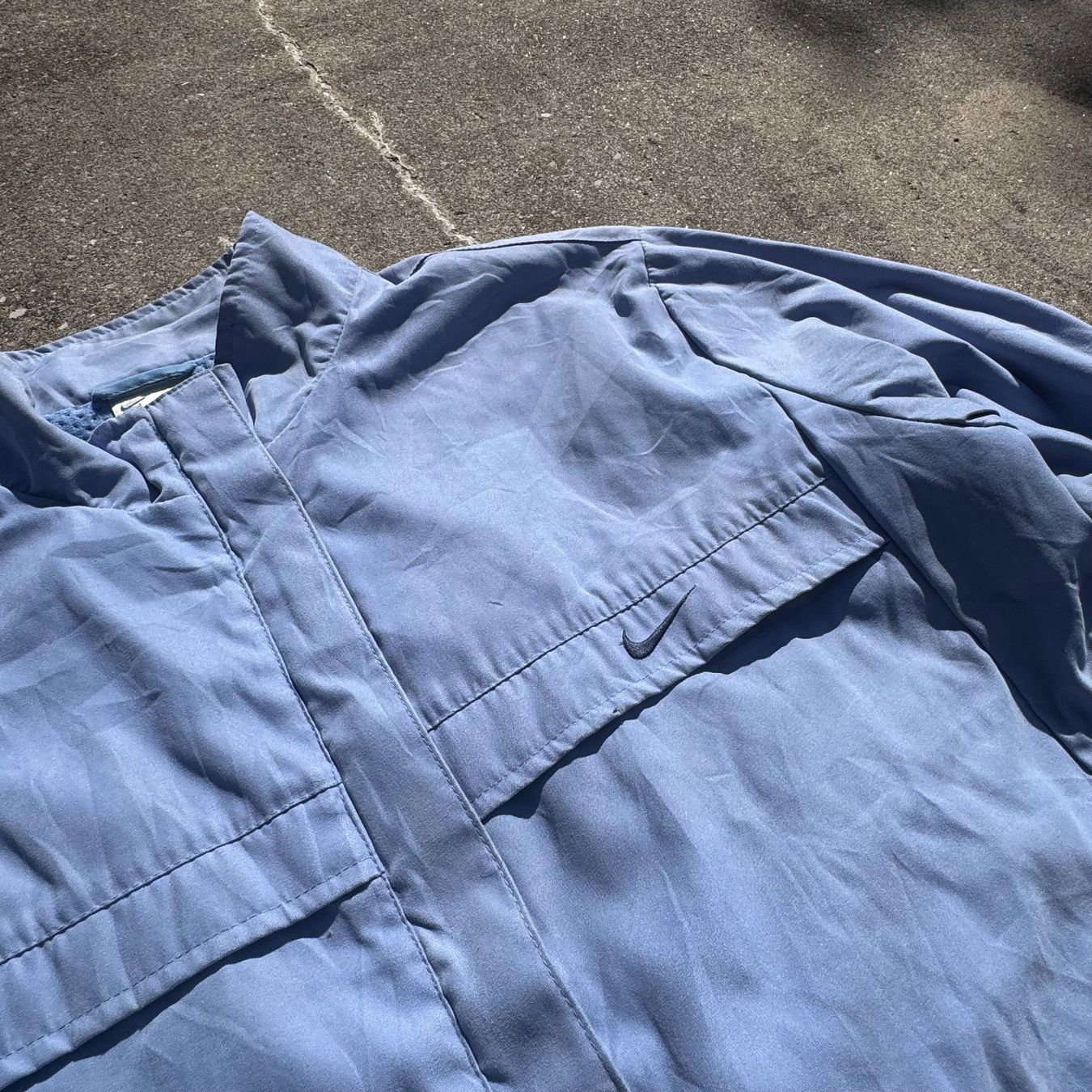 Nike Giacche: Nike vintage sky blue rain jacket – Usato da St. Gallen venduto da sourced_limited 1